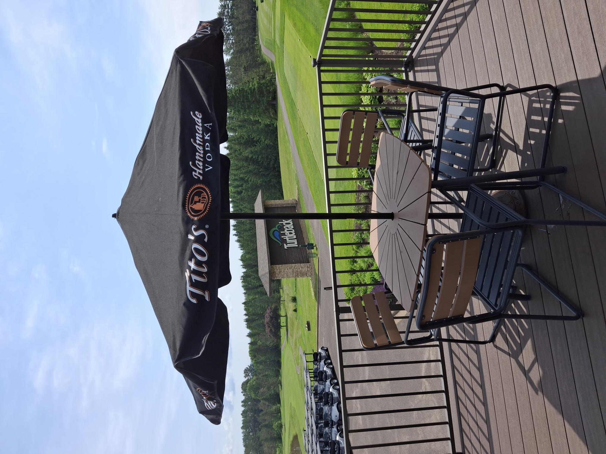 Deck Table With Titos Umbrella